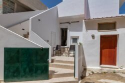 Irini apartments, the side entrance and the stairs to the top apartment