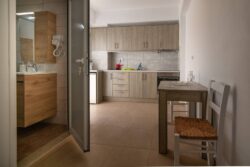 Irini apartments, the kitchen and the toilet of the first floor