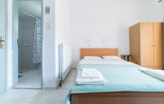 Irini Kamilari apartments, the bedroom and the toilet of room 1